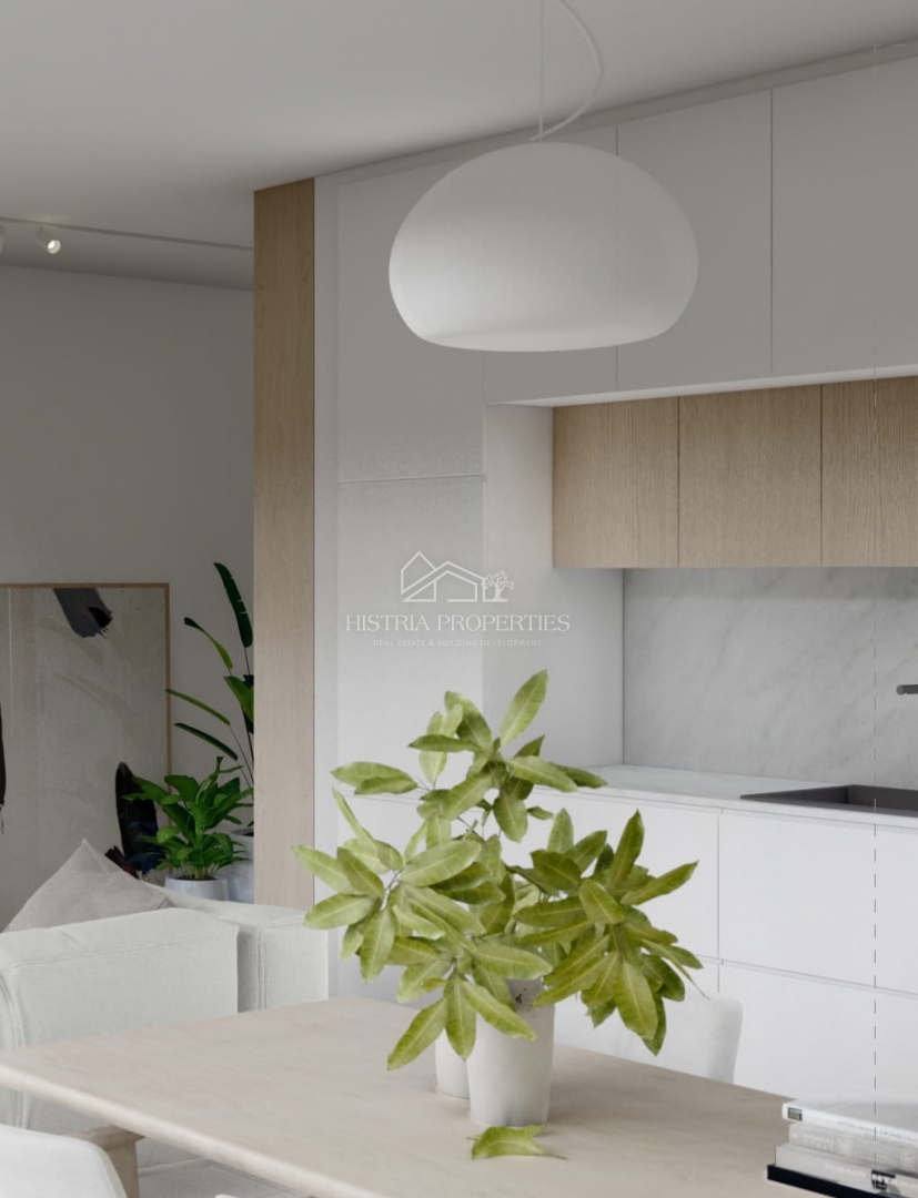 Qualità, buona posizione e appartamento con giardino in un nuovo edificio vicino a Rovigno