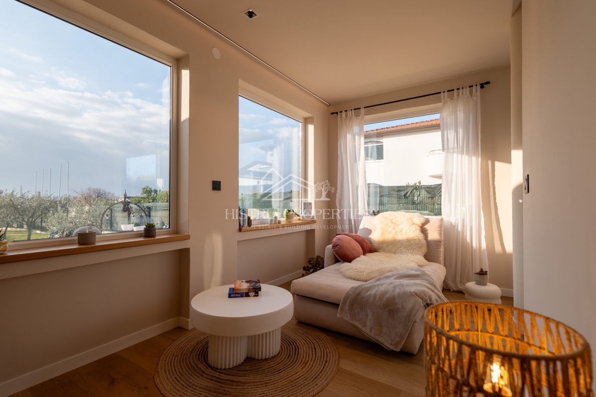 Casa con uliveto su ampio terreno edificabile e appartamento ristrutturato con grande potenziale