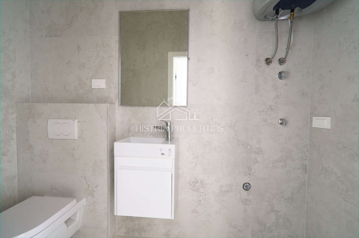 Ampio appartamento con giardino in un nuovo edificio moderno