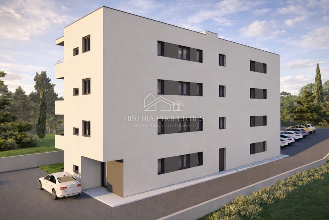 Appartamento con piscina e giardino al piano terra di una nuova palazzina per una piacevole vacanza