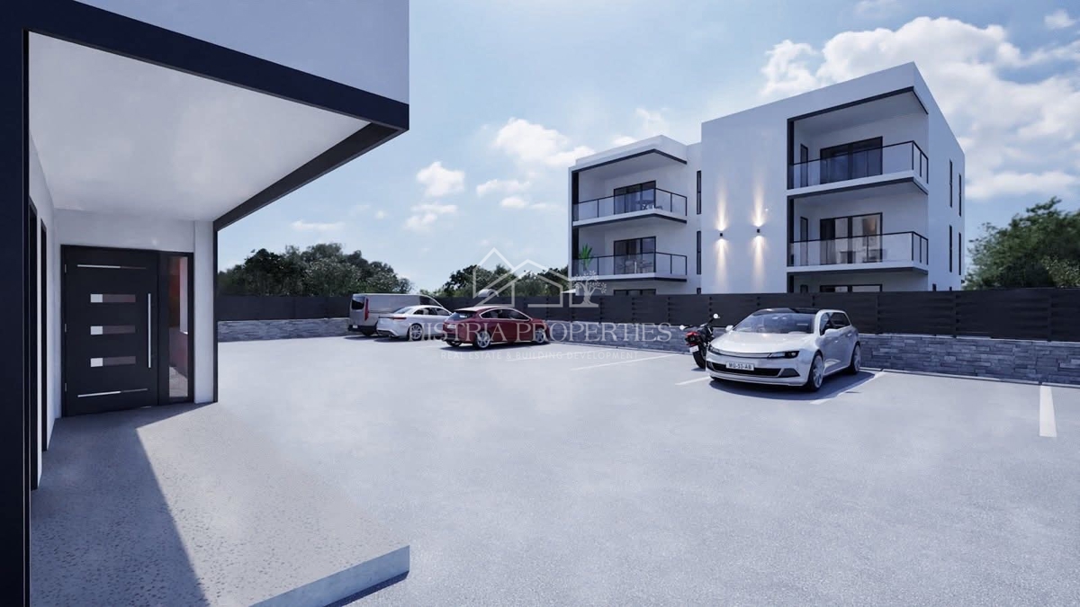 Pratico appartamento con giardino a 800 metri dal mare in un moderno edificio di nuova costruzione