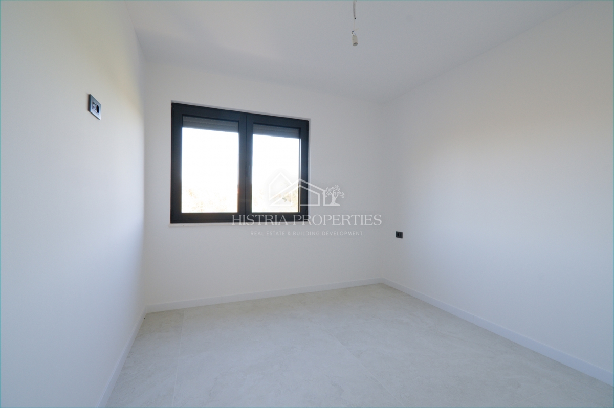 Un attico spazioso e di alta qualità con terrazza sul tetto in una posizione ricercata