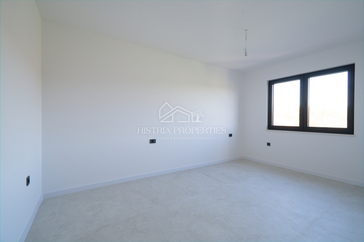 Un attico spazioso e di alta qualità con terrazza sul tetto in una posizione ricercata