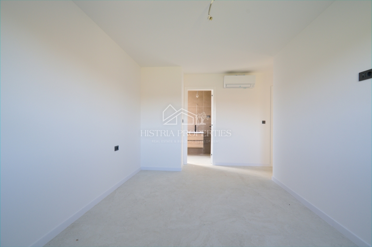 Un attico spazioso e di alta qualità con terrazza sul tetto in una posizione ricercata