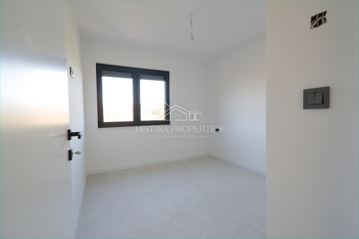 Un attico spazioso e di alta qualità con terrazza sul tetto in una posizione ricercata