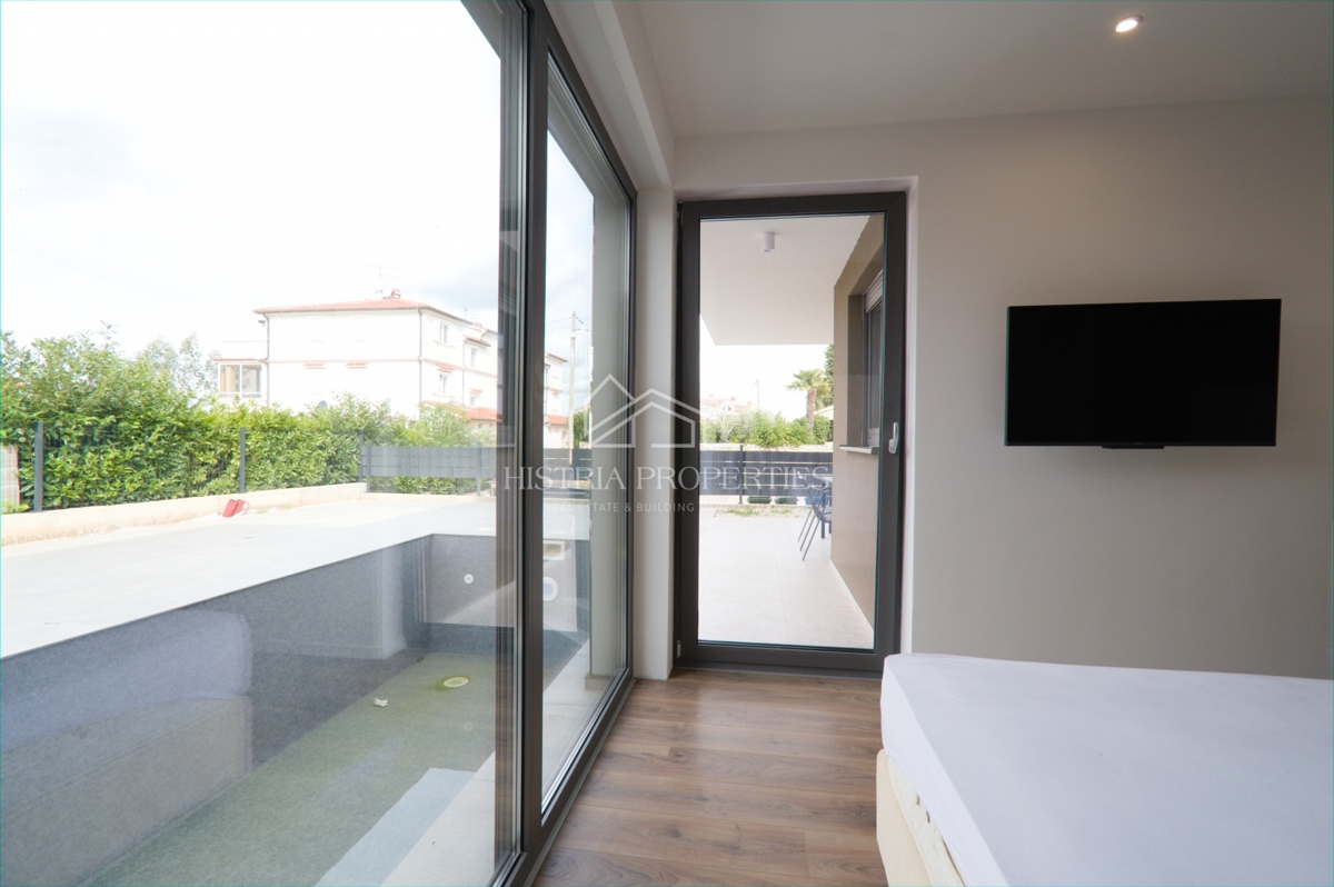 Spazioso appartamento con piscina, completamente attrezzato, con vista mare