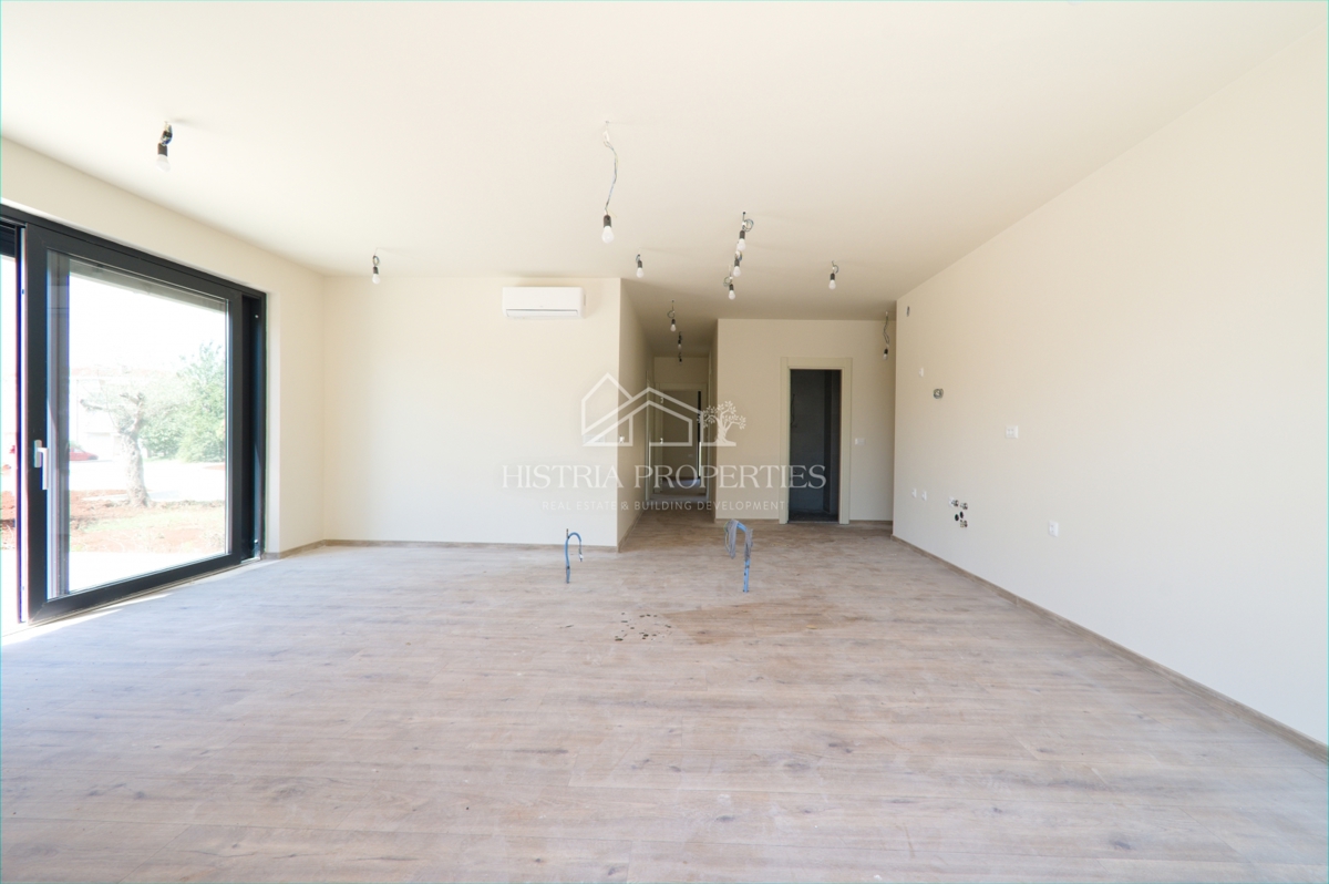 Appartamento al piano terra con piscina in comune in un lussuoso edificio di nuova costruzione