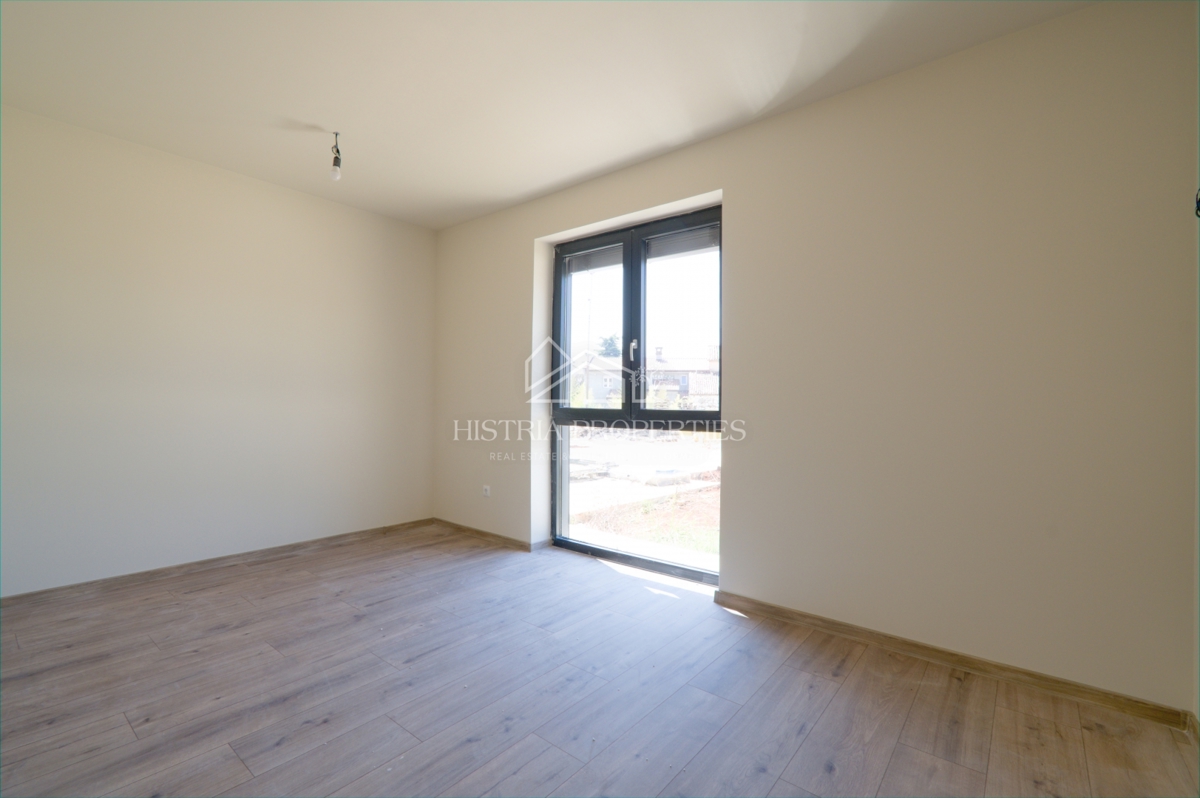 Appartamento al piano terra con piscina in comune in un lussuoso edificio di nuova costruzione