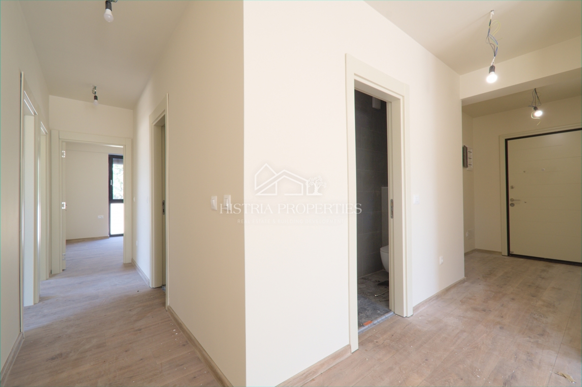 Appartamento al piano terra con piscina in comune in un lussuoso edificio di nuova costruzione