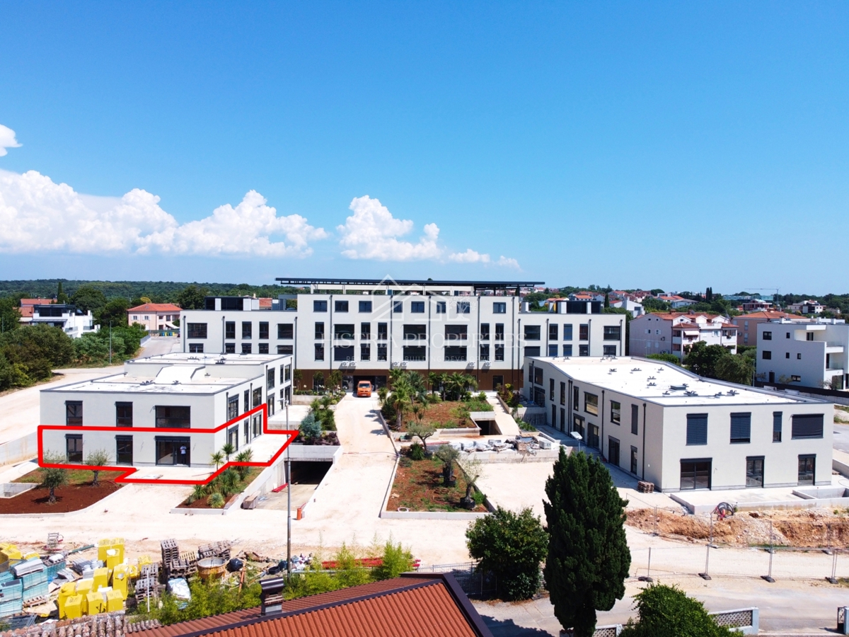 Appartamento al piano terra con piscina in comune in un lussuoso edificio di nuova costruzione