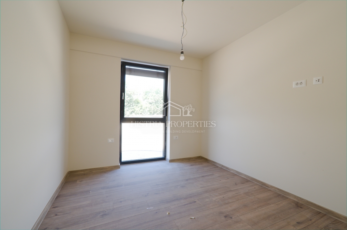 Appartamento al piano terra con piscina in comune in un lussuoso edificio di nuova costruzione