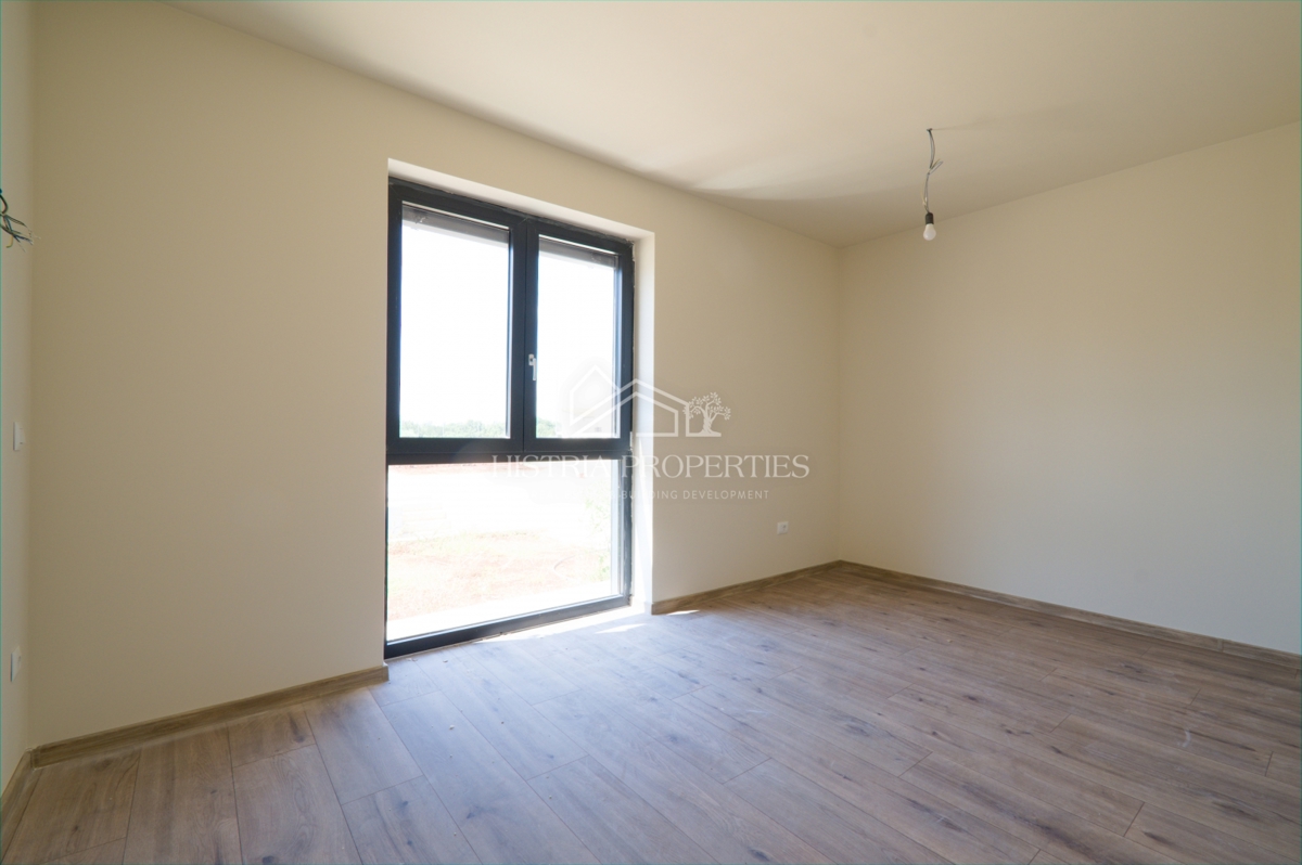 Appartamento al piano terra con piscina in comune in un lussuoso edificio di nuova costruzione