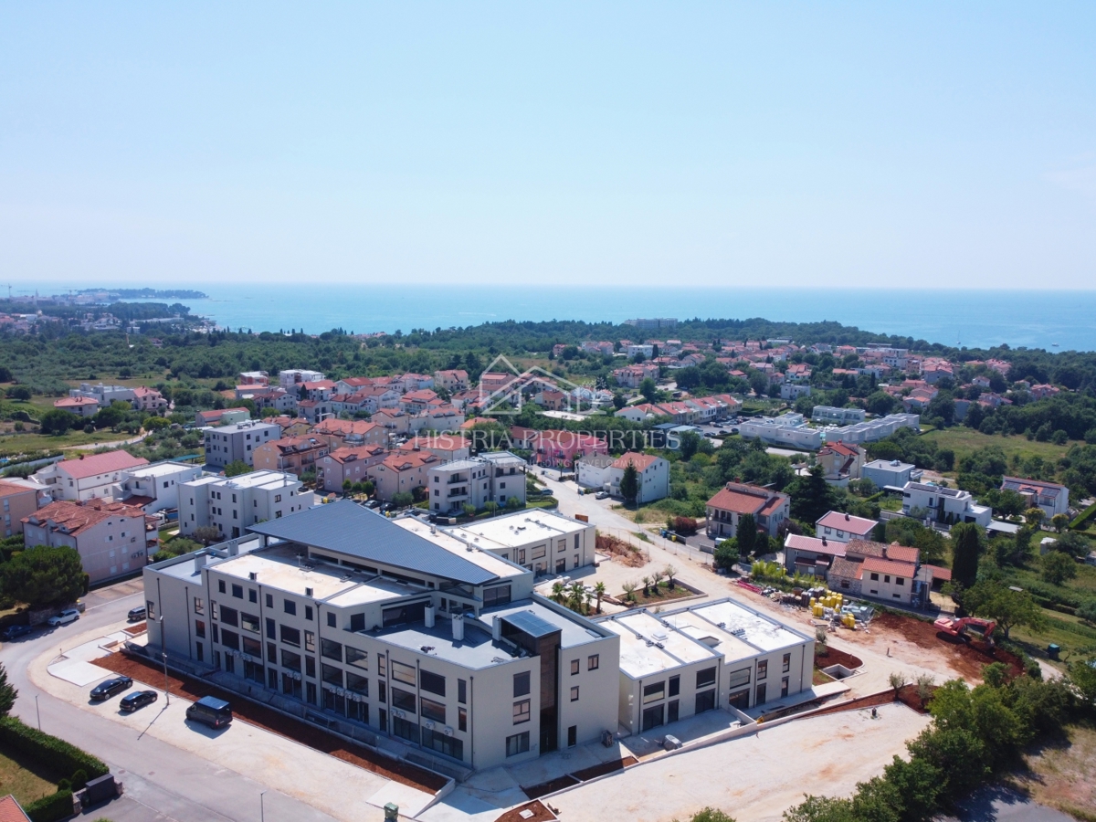 Appartamento al piano terra con piscina in comune in un lussuoso edificio di nuova costruzione