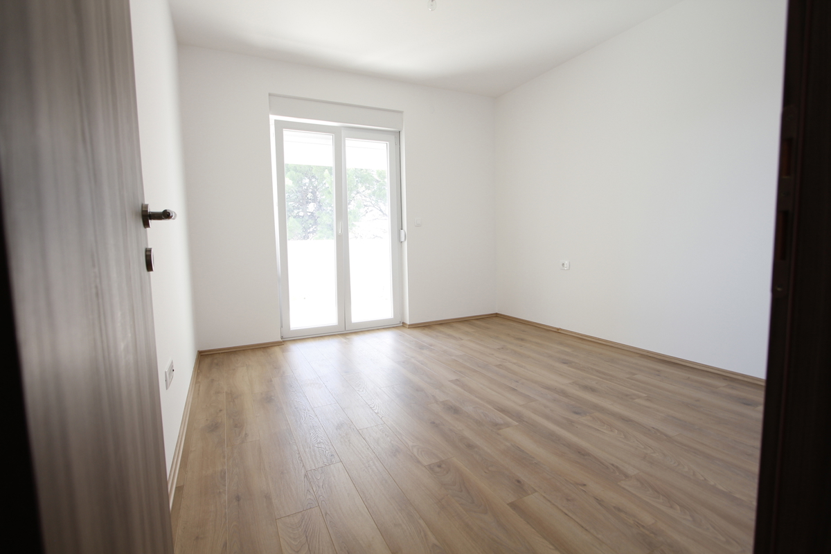 Ampio appartamento quadrilocale con giardino - nuova costruzione