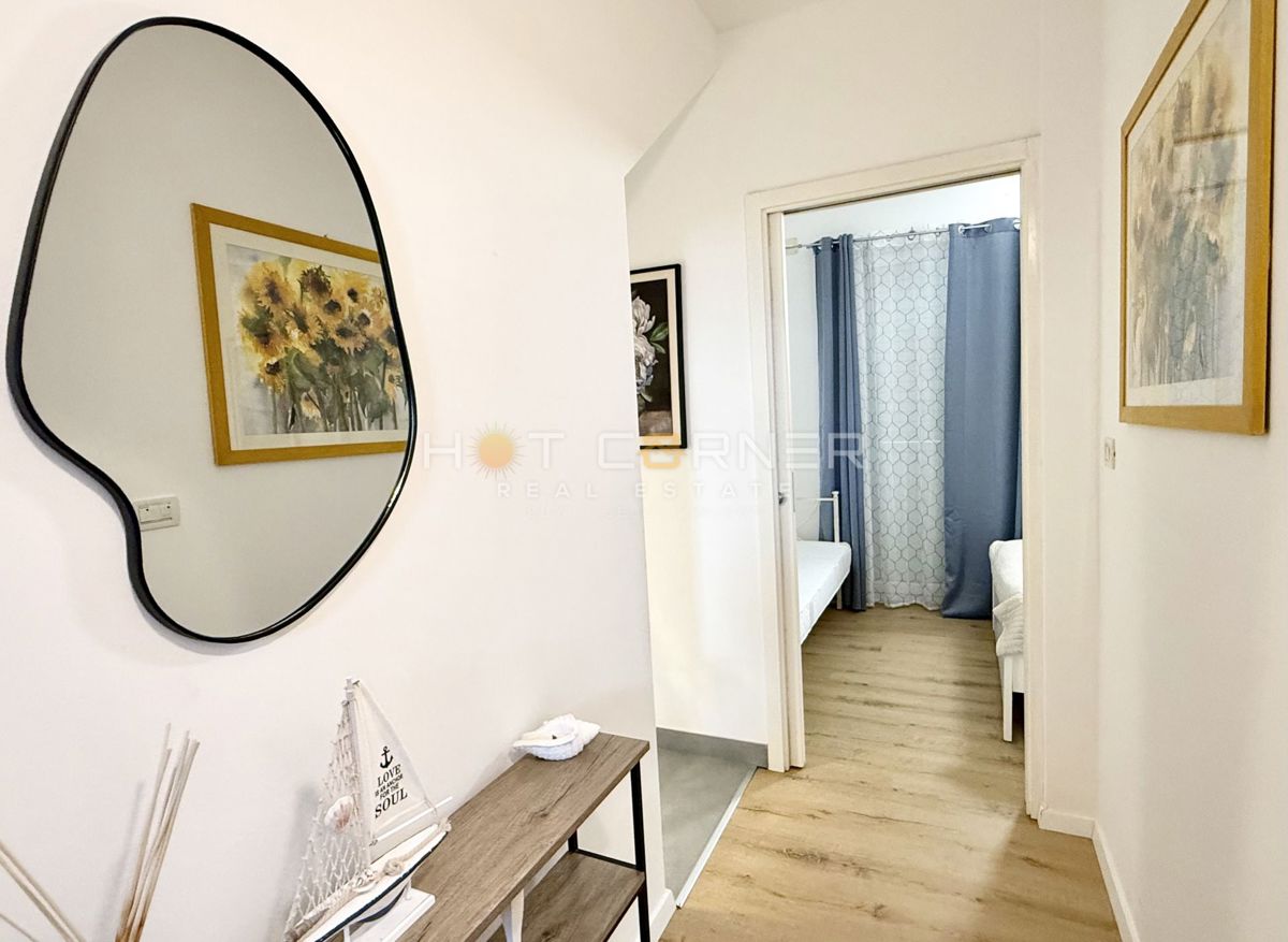 Casa con garage e vista mare