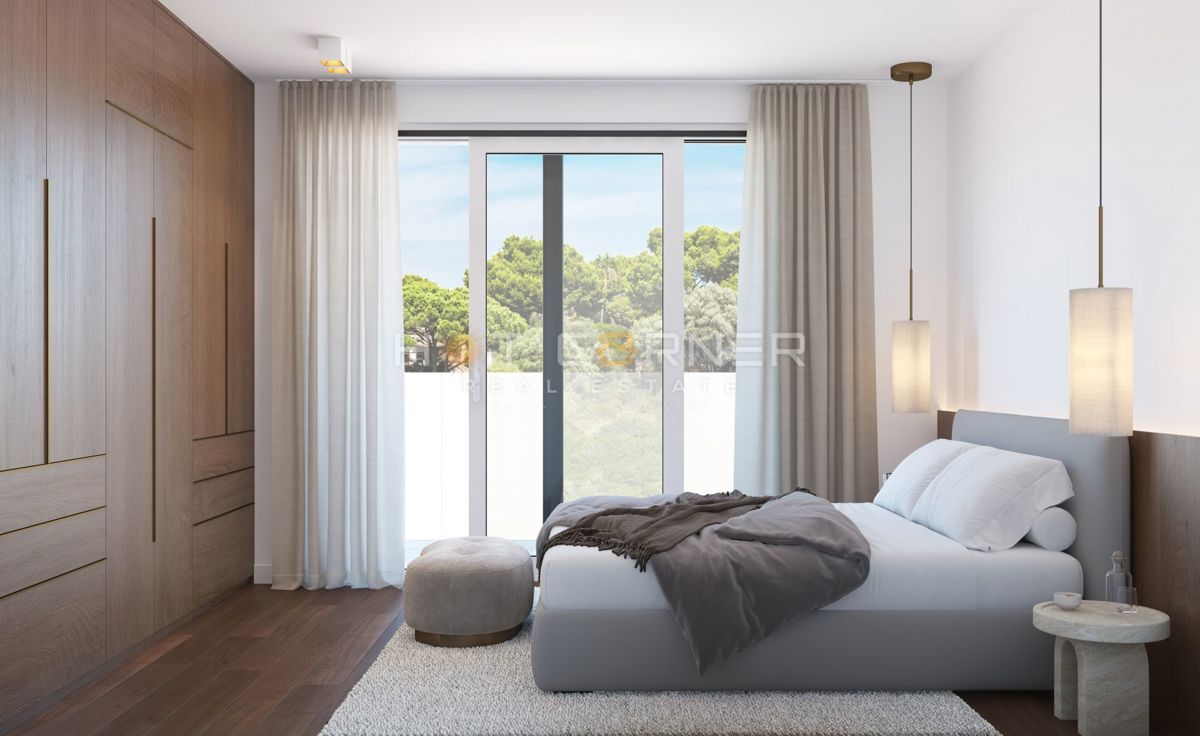 Elegante appartamento su tre livelli con giardino e vista mare