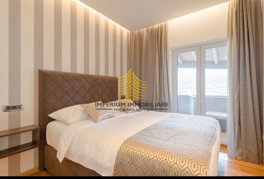 Lussuoso appartamento con tre camere da letto, garage + 2 posti auto