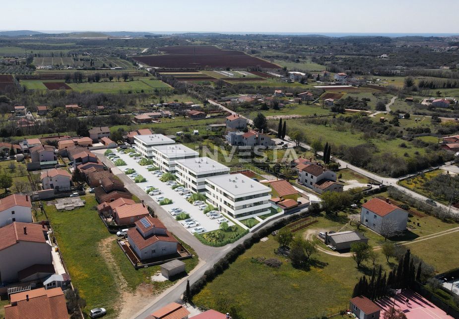 Zona Pula, appartamento al piano terra di nuova costruzione con giardino, posto auto