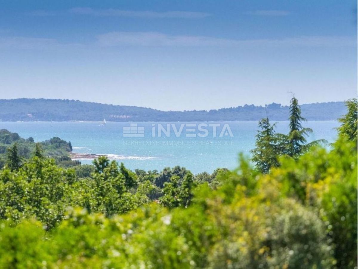 Barbariga, terreno con permesso di costruzione, vista mare