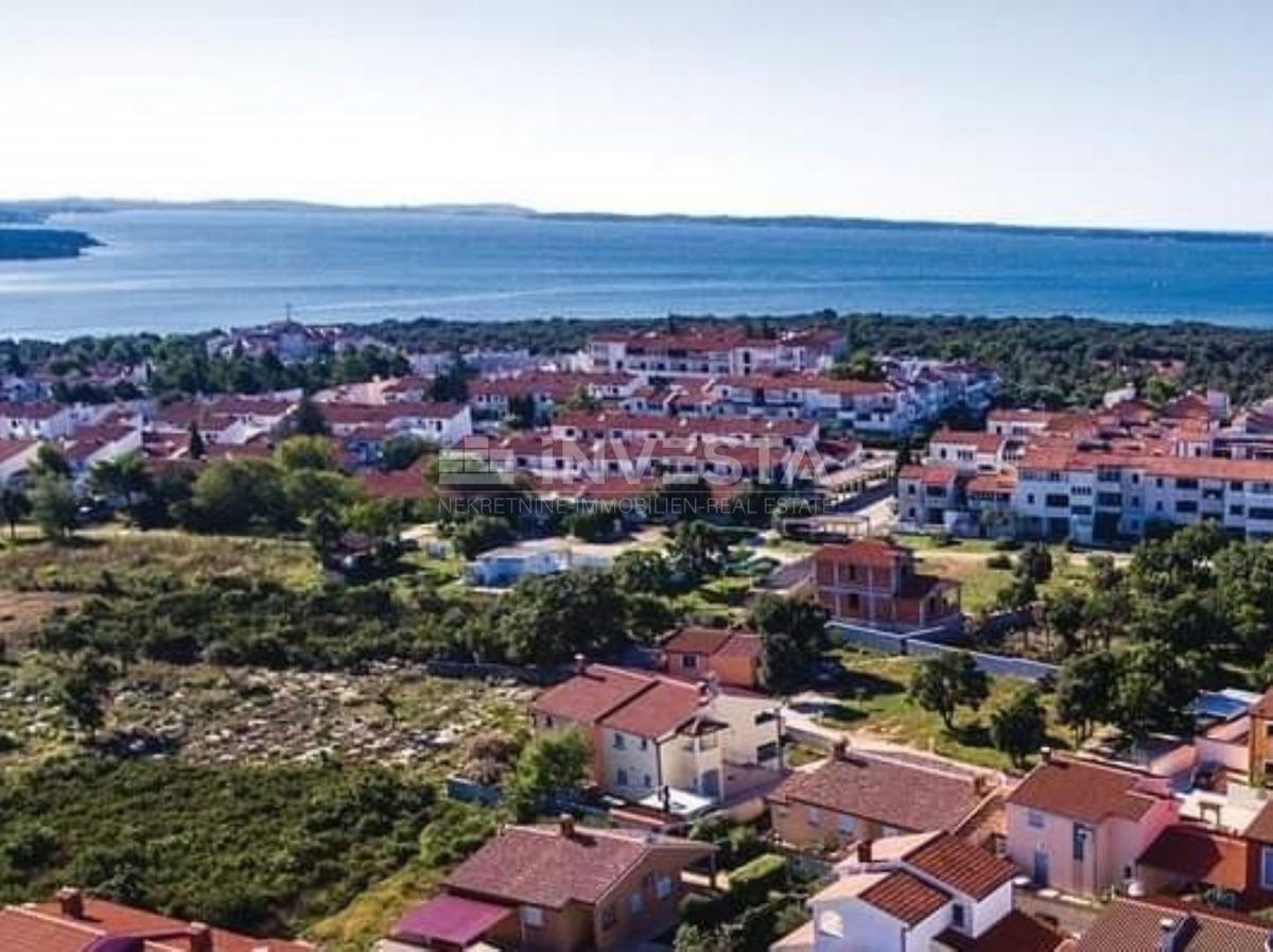 Barbariga, terreno con permesso di costruzione, vista mare
