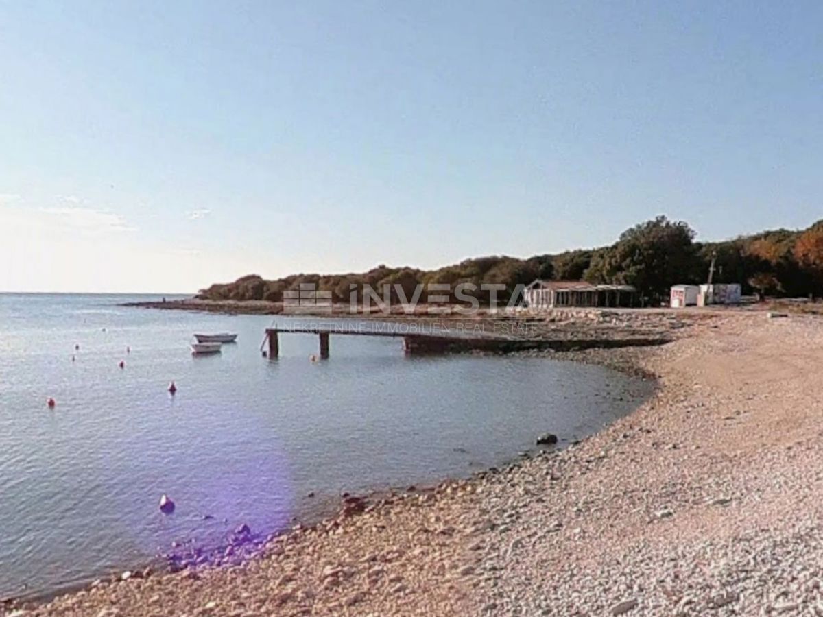 Barbariga, terreno con permesso di costruzione, vista mare