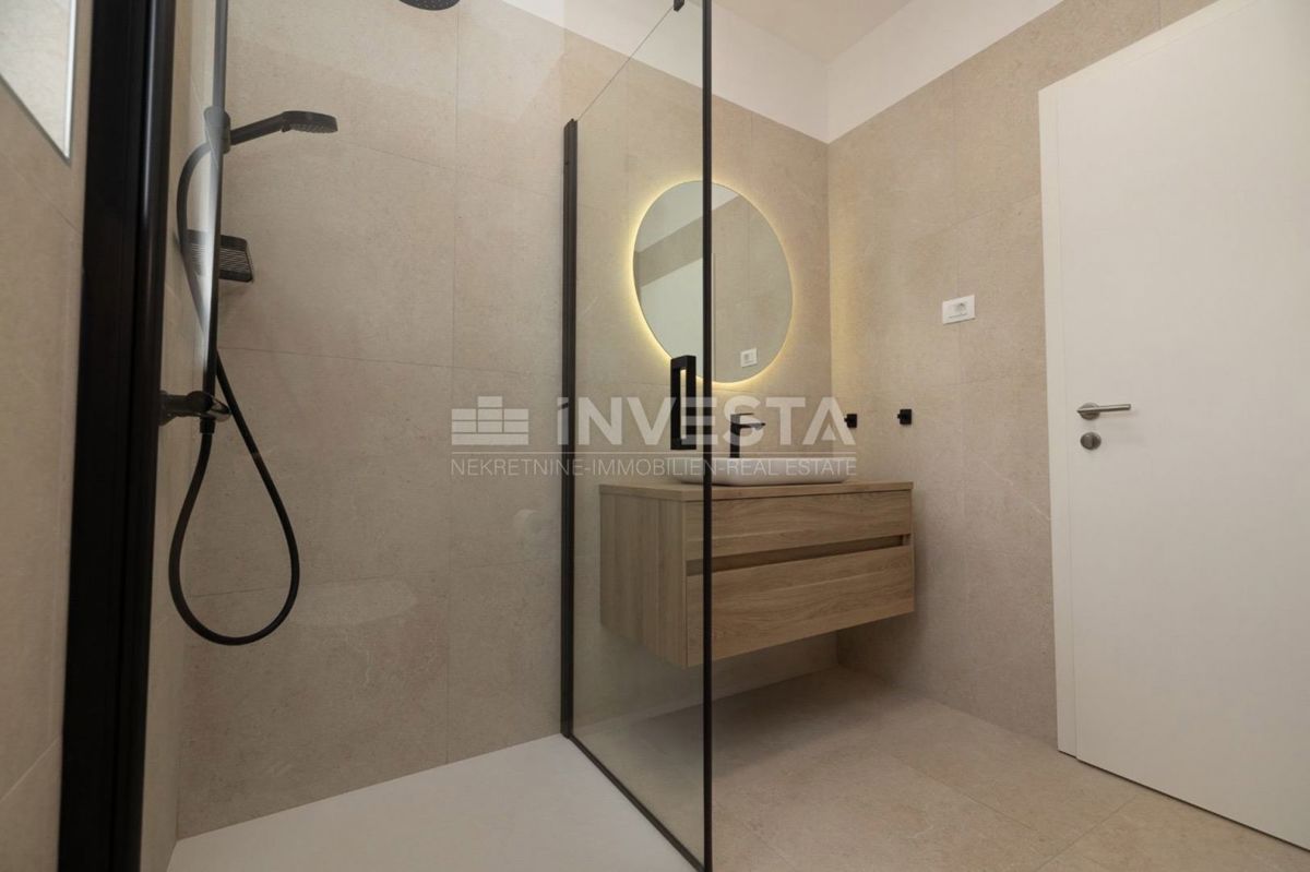 Casa al piano terra lussuosamente attrezzata con giardino