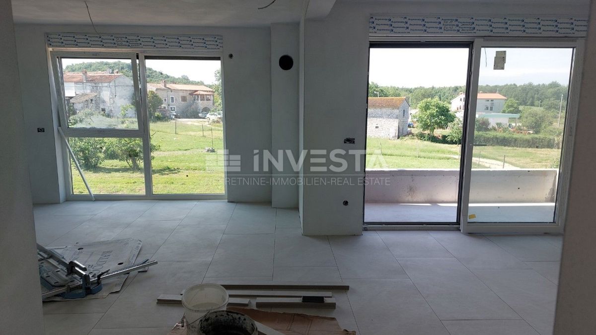  Zona di Poreč, appartamento confortevole in una nuova costruzione con giardino