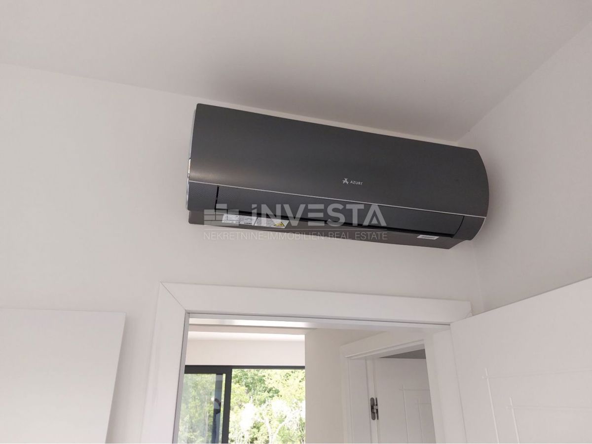 Dintorni di Labina, moderna villa al piano terra di 2 unità abitative, NUOVA!