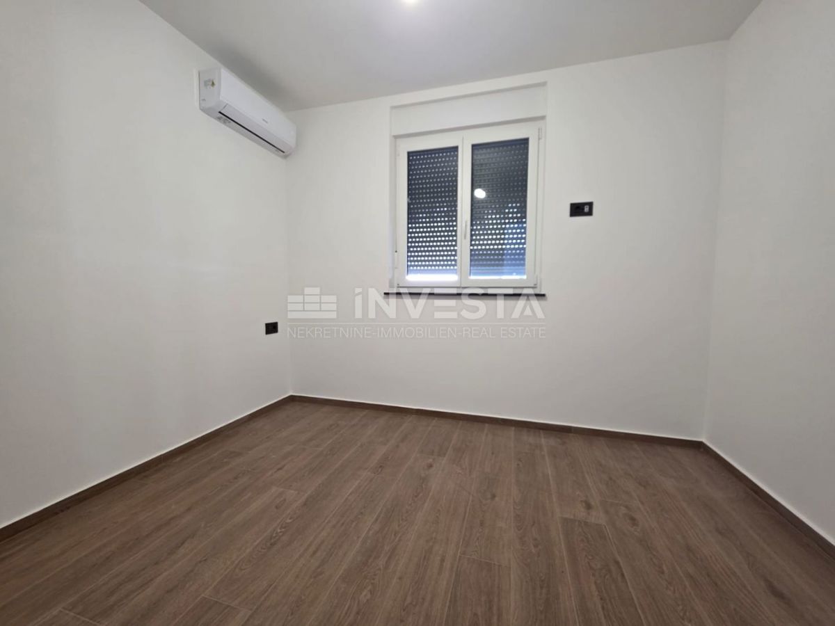 Appartamento con una camera da letto e giardino in nuova costruzione con certificato di agibilità