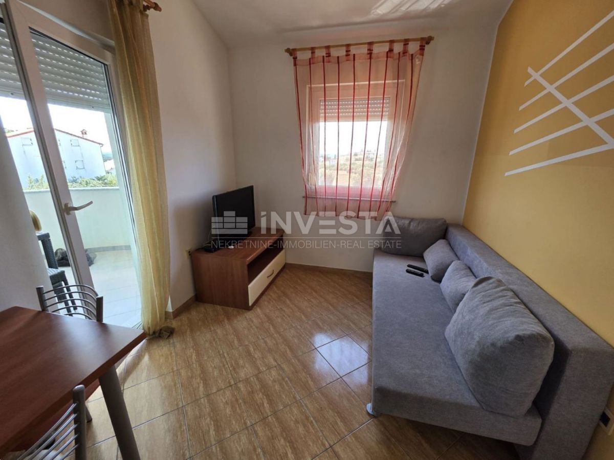 Barbariga, appartamento con due camere da letto, vista mare e piscina