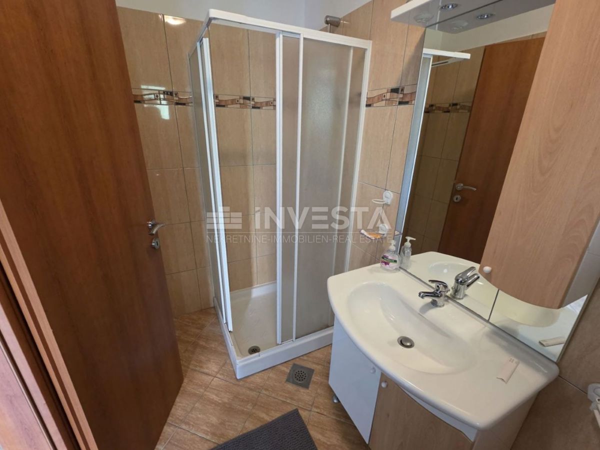 Barbariga, appartamento con due camere da letto, vista mare e piscina