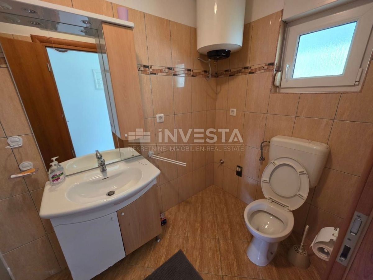 Barbariga, appartamento con due camere da letto, vista mare e piscina