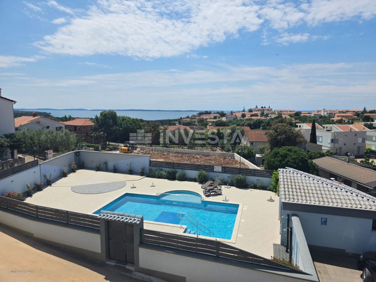 Barbariga, appartamento con due camere da letto, vista mare e piscina