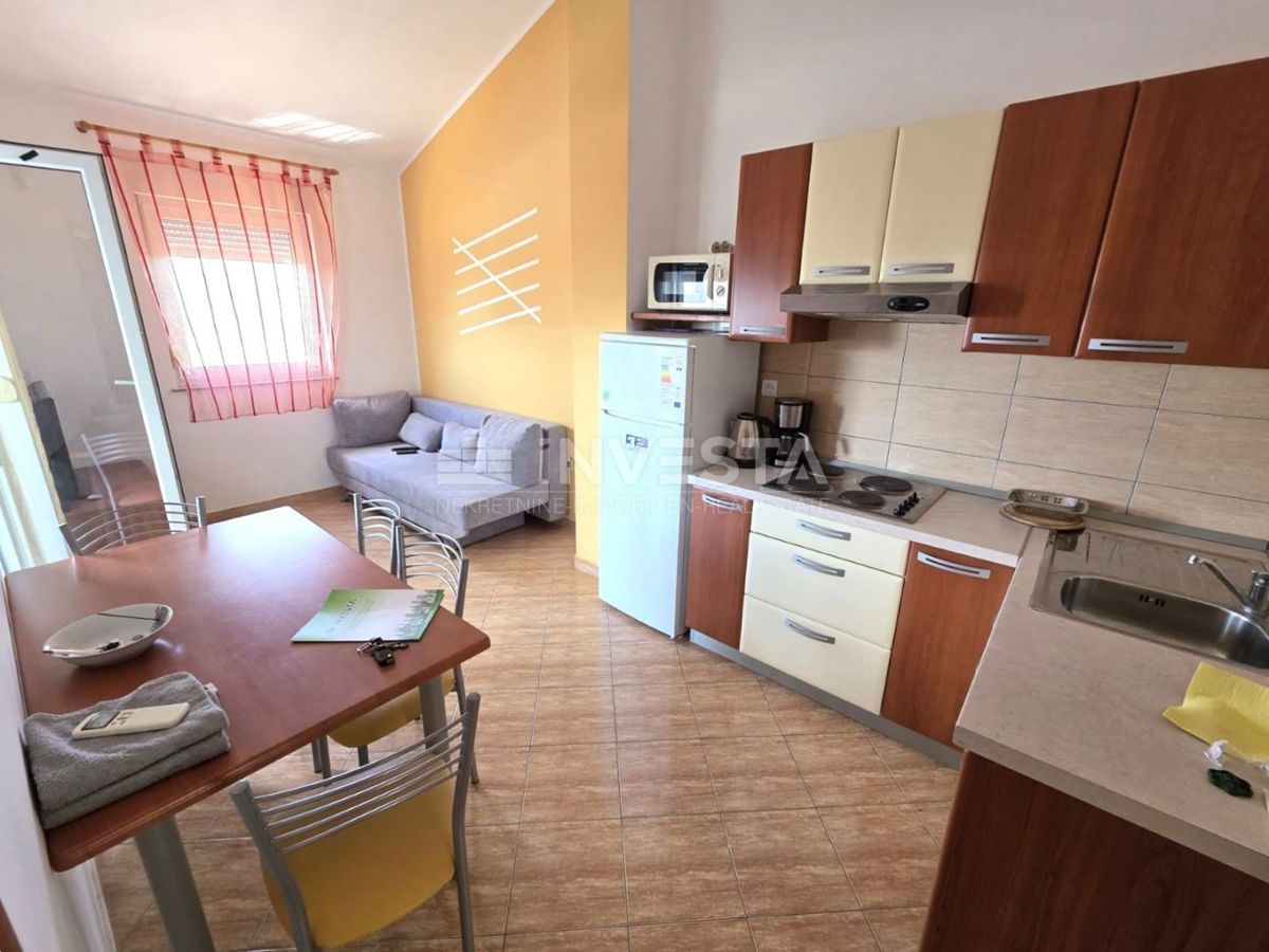 Barbariga, appartamento con due camere da letto, vista mare e piscina