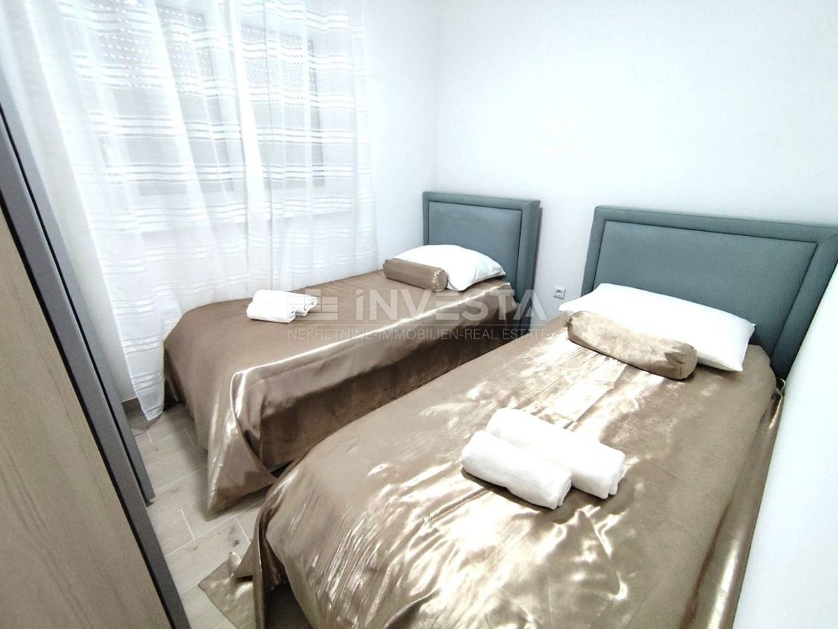 Appartamento al 2° piano, 2 camere da letto, terrazza, parcheggio, vicino al mare