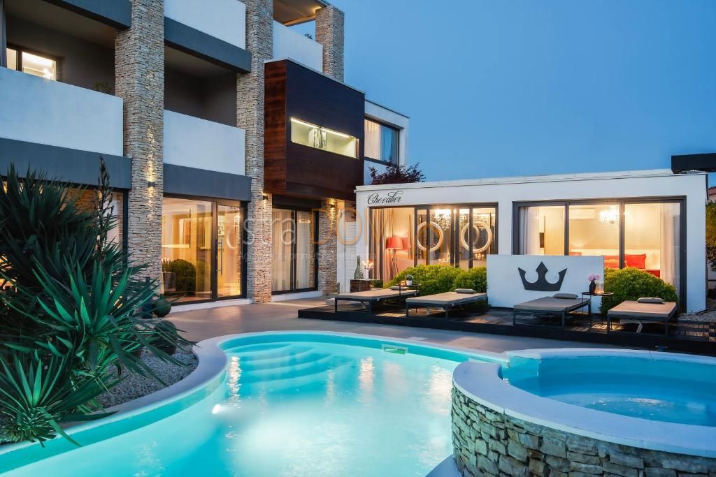 * BOUTIQUE DI LUSSO HOTEL CHEVALIER – MEDULINO *