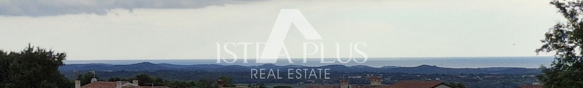 Casa in pietra con tre unità abitative e vista mare