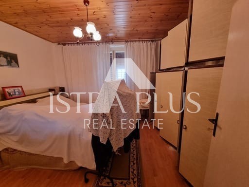 Casa in pietra con tre unità abitative e vista mare