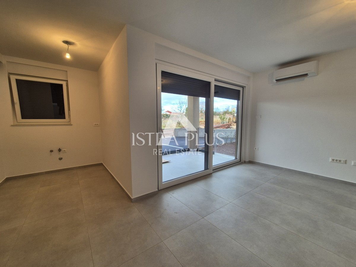 Appartamento in palazzo di nuova costruzione con ascensore - piano terra con cortile