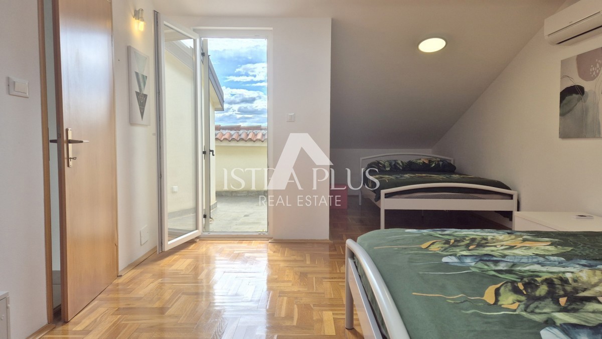 Casa a schiera di 103 m2 - con tre camere da letto e un giardino paesaggistico