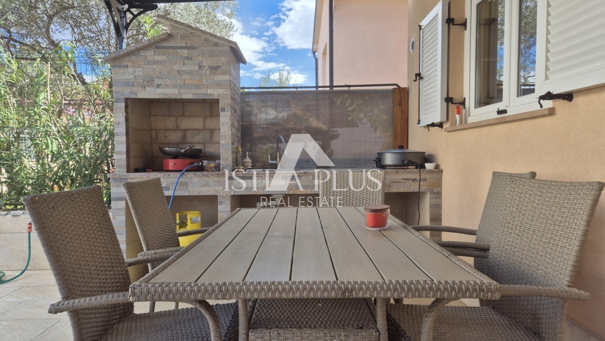 Casa a schiera di 103 m2 - con tre camere da letto e un giardino paesaggistico