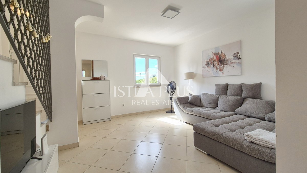 Casa a schiera di 103 m2 - con tre camere da letto e un giardino paesaggistico