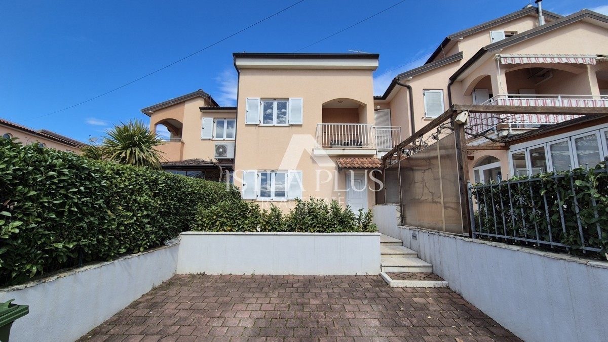 Casa a schiera di 103 m2 - con tre camere da letto e un giardino paesaggistico