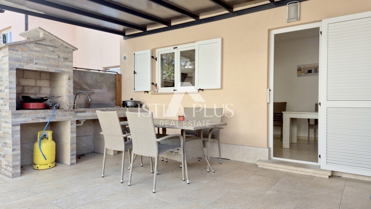 Casa a schiera di 103 m2 - con tre camere da letto e un giardino paesaggistico