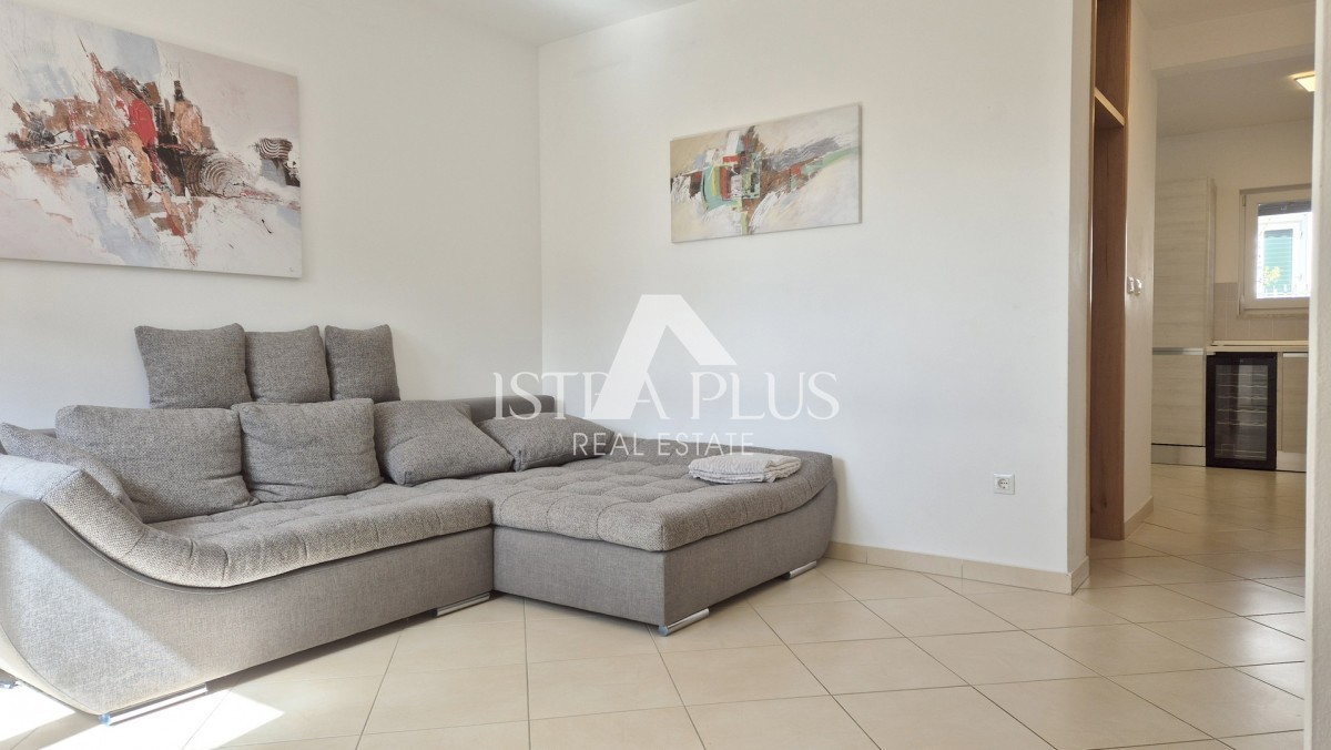 Casa a schiera di 103 m2 - con tre camere da letto e un giardino paesaggistico