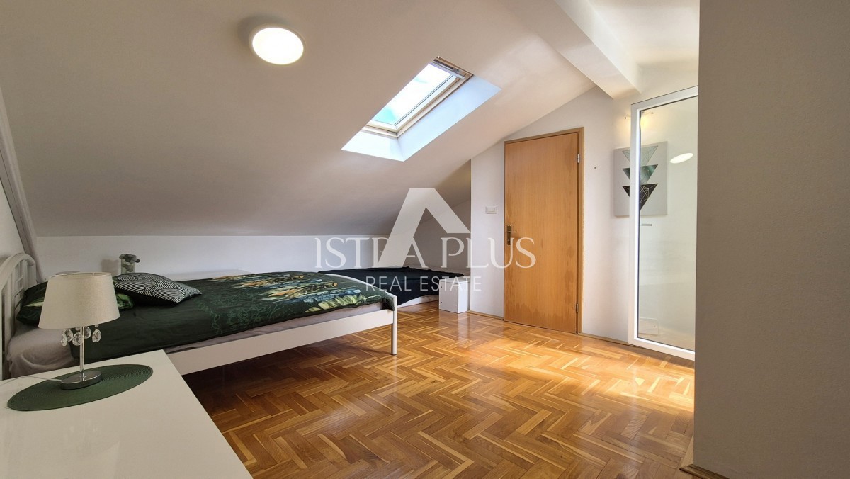 Casa a schiera di 103 m2 - con tre camere da letto e un giardino paesaggistico