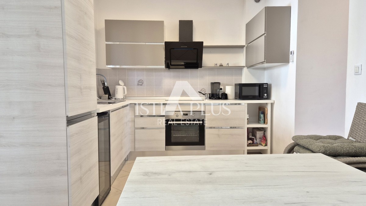 Casa a schiera di 103 m2 - con tre camere da letto e un giardino paesaggistico