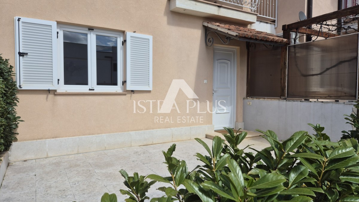 Casa a schiera di 103 m2 - con tre camere da letto e un giardino paesaggistico