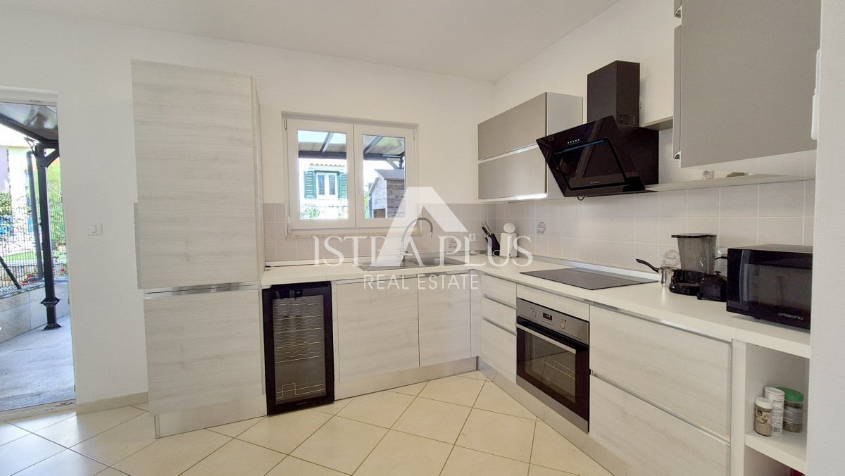 Casa a schiera di 103 m2 - con tre camere da letto e un giardino paesaggistico