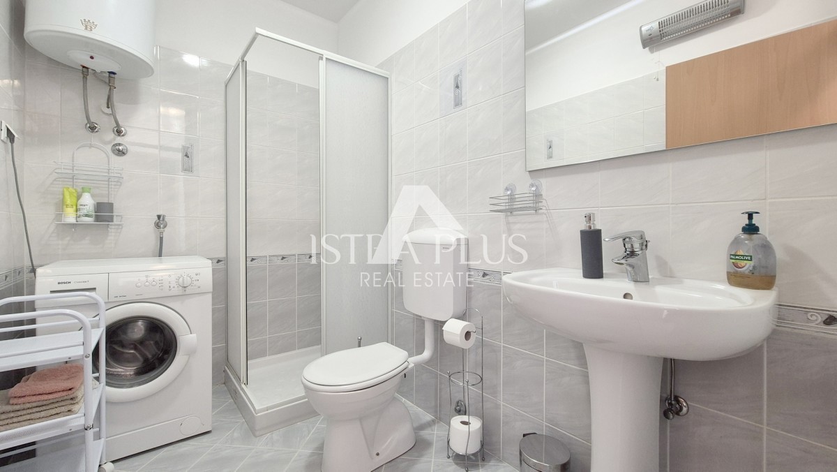 Casa a schiera di 103 m2 - con tre camere da letto e un giardino paesaggistico